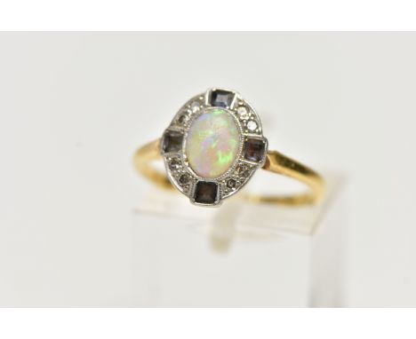 AN EARLY 20TH CENTURY OPAL DRESS RING, oval cabochon opal, within a surround of eight single cut diamonds and four square cut