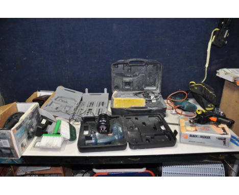 A TRAY CONTAINING POWER TOOLS including a Black and Decker D155HT drill, a wallpaper stripper, car vac, BD405r cordless drill