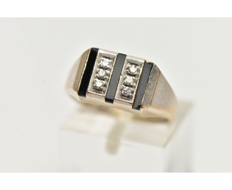 A WHITE METAL SIGNET RING, two rows of three round brilliant cut diamonds grain set with three rows of inlay onyx, leading on