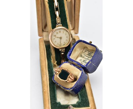 AN EARLY 20TH CENTURY SIGNET RING AND A WRISTWATCH, a yellow gold signet ring inlay set with a shield shaped bloodstone, stam