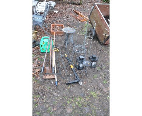 A SELECTION OF METAL GARDEN ITEMS AND SOME GARDEN TOOLS including o cylindrical pot stand 200cm tall, a bird bath 52cm high, 