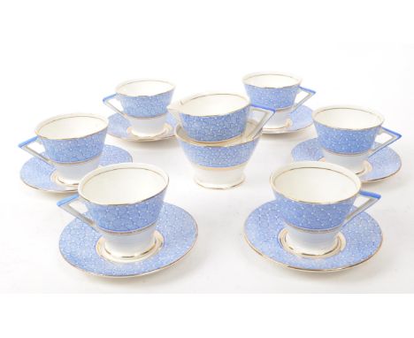 A collection of vintage early 20th-century art deco porcelain tea service pieces, in the style of Shelley J Mode. Including s