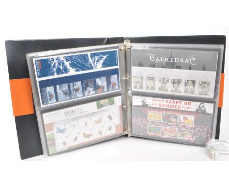 A collection of 21st-century British Royal Mail stamp presentation packs. The collection includes examples such as, 'The Beat