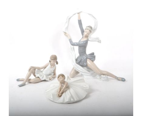 Nao - Lladro - Three contemporary late 20th century porcelain dancer figurines, comprising of two ballerinas in tutu skirts, 