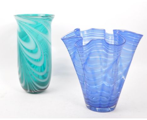 Two vintage mid 20th century studio art glass vases. One of tall rounded form with flared lip to top, the other having folded