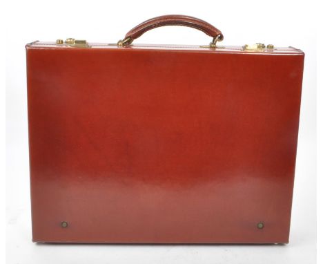 Pickett - A vintage late 20th century circa 1990s Pickett tan leather attache / briefcase. The case having dark tan leather e