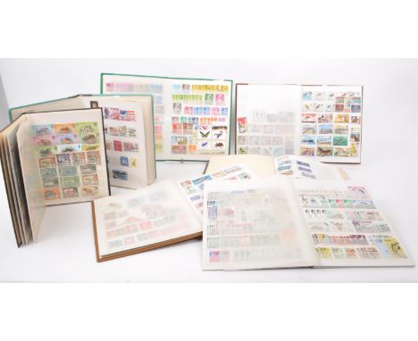 A collection of 20th century British and Foreign postage stamps. The collection across seven small stamp albums. To include e