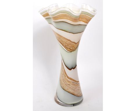 A vintage 20th-century flared art deco-style vase, with a grey, blue, and brown sedimentary rock style design. Features a fla