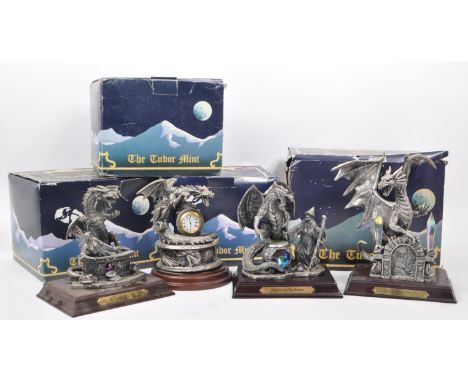 Myth &amp; Magic by The Tudor Mint - Four early 21st century cast pewter statue dragon figurines. Including 'The Enchanted Po