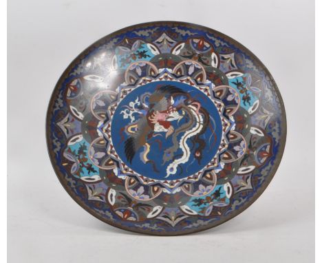 A vintage early 20th century Japanese cloisonne metal dish. Decorated in blue, purple and red colours, with floral and geomet
