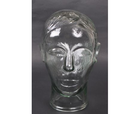 A vintage 20th century pressed glass milliners / phrenology type bust head with moulded features.