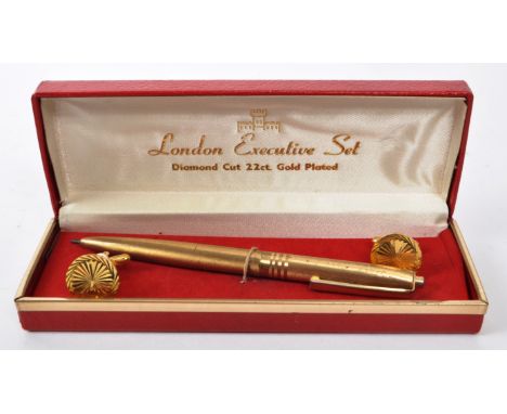 A vintage 20th century London Executive 22ct gold plated pen and cufflink set. The pen having brushed finish to body. In orig