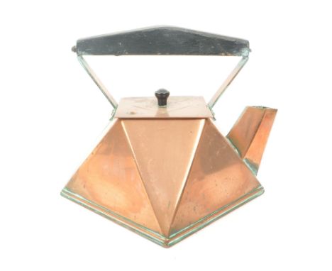 A vintage 1920's art deco style copper kettle. Featuring an angular, triangular form, a square lid and a wooden handle. Measu