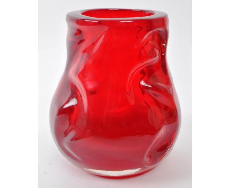 A vintage mid-century Whitefriars 'knobbly' red art glass vase. Featuring an uneven, textured exterior. Measuring approx. 15c