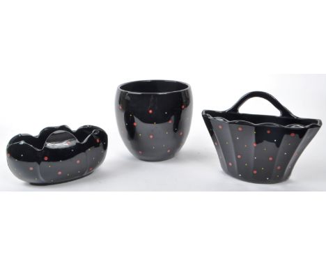 Bagley - A collection of three 20th-century art deco polka dot ceramic pieces, comprising of a vase, a hand-bag shaped plante