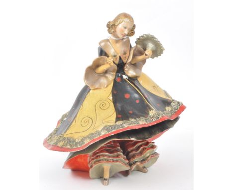 Wade - An early 20th century 1930s Art Deco Wade Daisette figure. The figure having printed stamp to base. AF