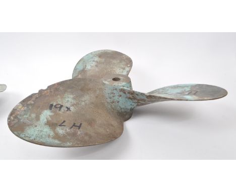 Two vintage brass boat propellers. One numbered '360 02817 1881 018', measuring approx. 46cm in diameter, and singular blade 