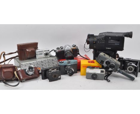 A large collection of vintage cameras, including binoculars and video camera. Featuring makers such as Asahi Pentax, Halina, 