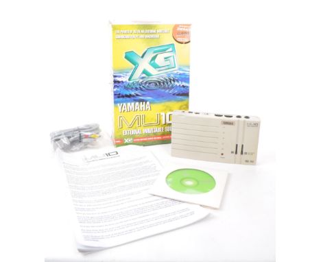 YAMAHA—A vintage 1998 MU10 external wavetable soundcard and tone generator for PC and Macintosh. The original box, installati