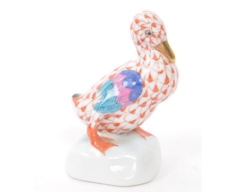 Herend - A vintage 20th century Herend porcelain duck figure. The figure in the form of a duck with red fishnet decoration al