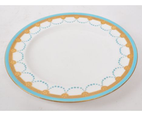 Mintons - A vintage 19th century jewelled blue and white plate, with gilt decoration to the border. Printed to the reverse 'M