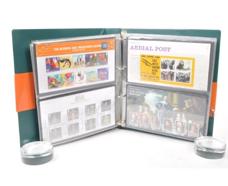 A collection of 21st-century British Royal Mail stamp presentation packs. The collection includes examples such as, 'Classic 