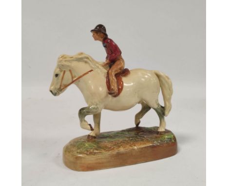 Royal Doulton figure group The Dapple Grey by W M Chance HN 2521, modelled as a farmers boy riding a dapple grey horse on nat