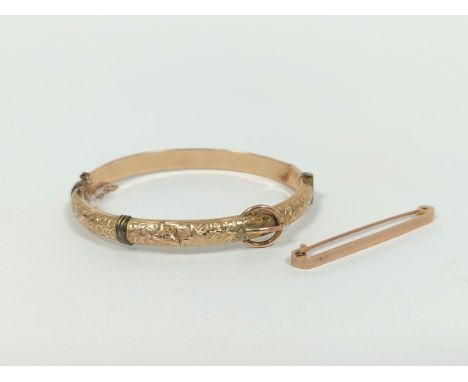 9ct gold hinged bangle, and a similar pin, 11g. 