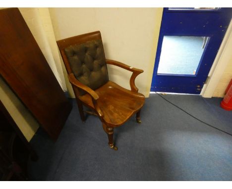 Edwardian oak and elm gentleman`s study chair, the show-wood frame with button leather back panel above scroll arms and deep 