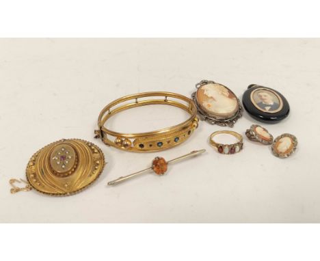 Victorian gold and onyx mourning brooch, with pearl spray, a gilt metal brooch and bangle, and other items.Condition report -