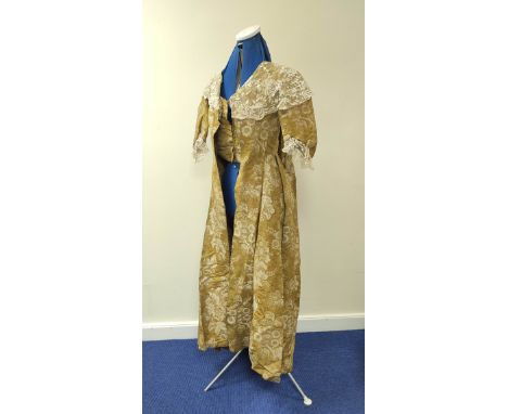 18th century sack-back gown or robe à la Française, in gold and cream silk brocade with lace collar and cuffs. Wear comensura