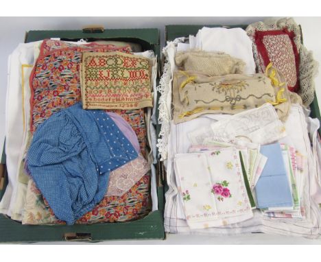 A quantity of assorted embroidered and printed table linen and textiles, two lace making pillows, a quantity of vintage handk