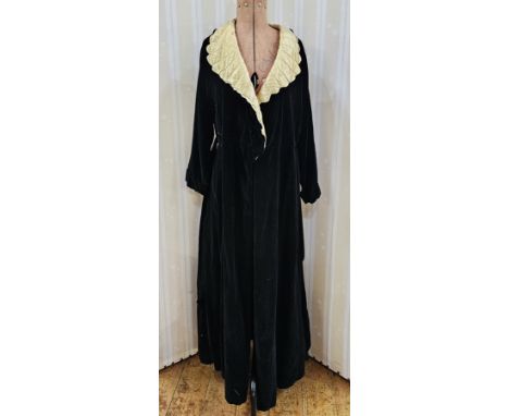 A 1940's velvet house coat/dressing gown with cream satin quilted shawl collar (with stains), with a velvet tie belt, full le