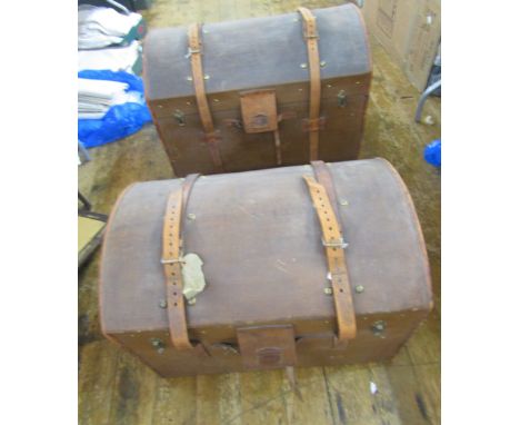 Two vintage domed travelling trunks, both with leather straps and fitted trays, one 71cm x 51cm approx and 52cm high approx, 