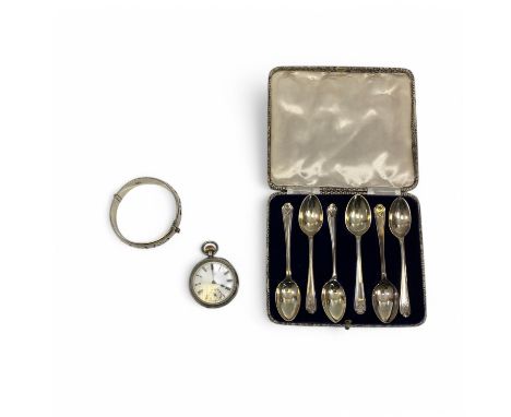 A collection of silver items including a Mexican silver bangle (44.5g), 6 boxed silver spoons with golf club motif each spoon
