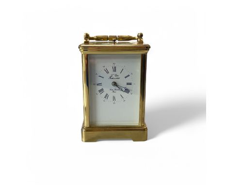 A 20th century French brass carriage clock, by L'Epee. Saint-Luxanne, with an enamel dial and striking on a gong  17.5cm high