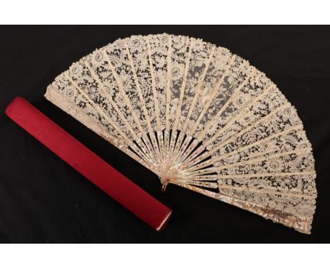 A Brussels Mixed Lace Fan, circa 1890's, the monture of carved and gilded pink mother-of-pearl. The leaf, worked with mainly 