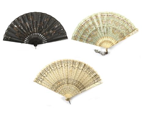 An Early 20th Century Sequin Fan, the pale green silk leaf mounted on bone, the sequins in gold and silver and of differing s