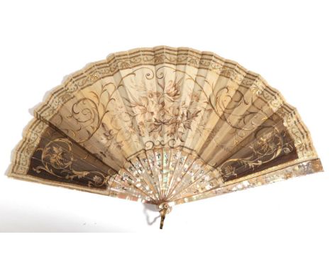 An Early 20th Century Pink Mother-of-Pearl Fan, the monture gilded and silvered, the silk leaf backed in cream gauze. The rec