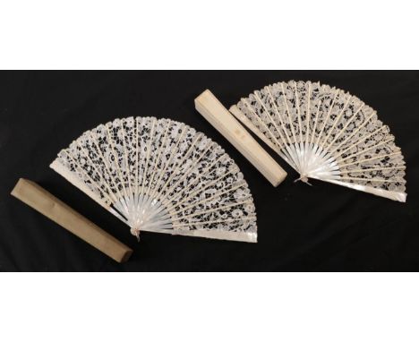 An Early 20th Century Small Belgian Bobbin Lace Fan, probably Bruges, the leaf mounted on white mother of pearl, contained in