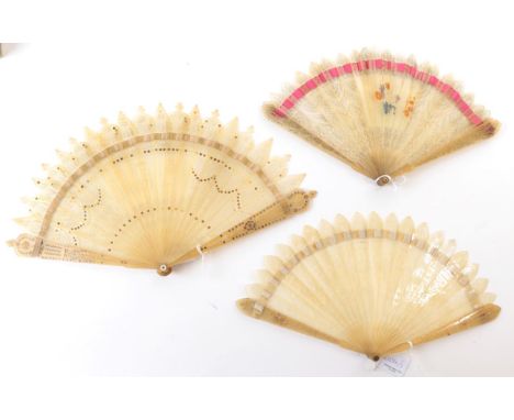 Three Early 19th Century Horn Brisé Fans, the first with alternate gothic style sticks and rounded shapes with a cross at the