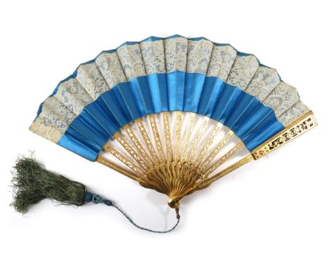 A 19th Century Fan, the wooden monture painted brightly in gold, the double leaf of a vibrant blue silk satin, a fragment of 