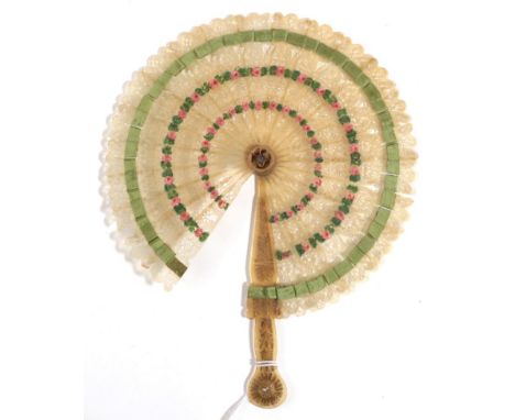 A Horn Cockade Fan, circa 1810, the pierced and fretted sticks decorated with two concentric bands of painted decoration, sho