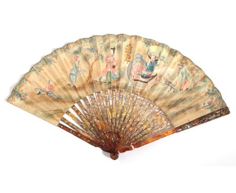 A Late 18th Century Blond Tortoiseshell Fan, the monture carved, pierced and gilded, the gorge in particular with figures the