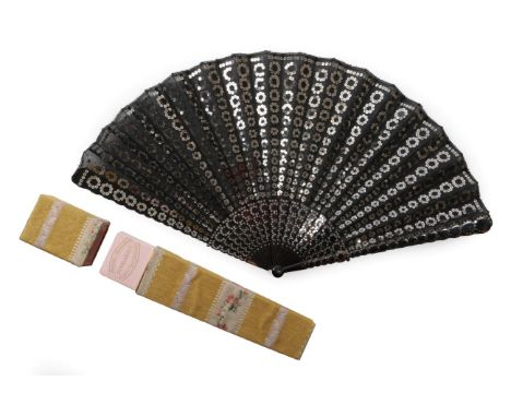An Early 19th Century Tortoiseshell Fan, the black double gauze leaf and monture embellished with a linear design of flower h