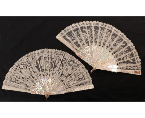 A Circa 1870's Fan, with a handmade lace leaf mounted on pink mother-of-pearl sticks and ribs, the upper guard bearing a gold