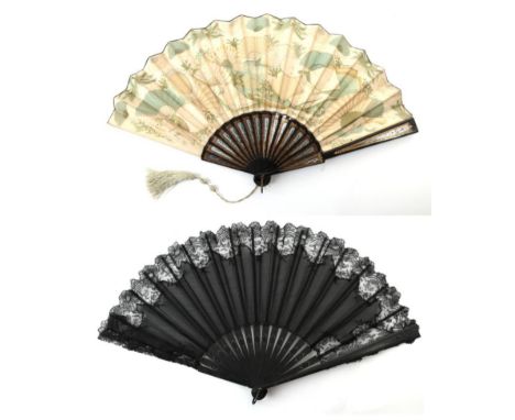 A Late Victorian Fabric Fan, mounted on black wooden sticks, with unusual gold and ice blue decoration, the cream silk leaf p