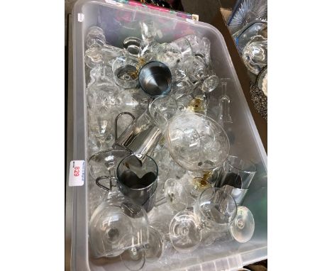 A quantity of glassware in a plastic tub 