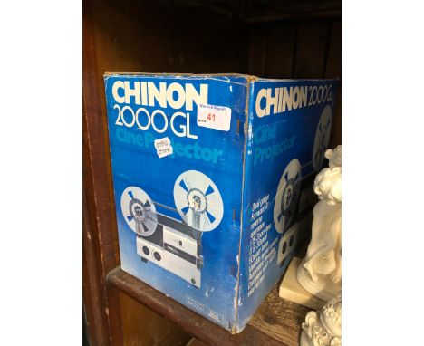 A Chinon cine projector and a screen 