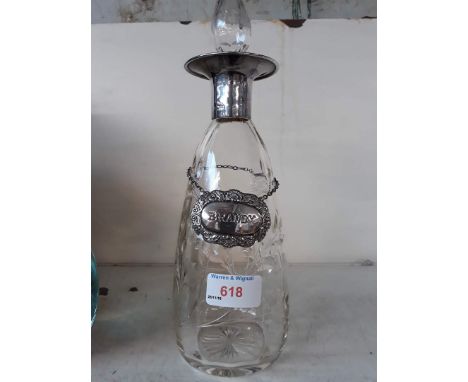 Glass decanter with silver collar 